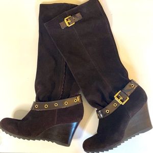 Micheal Kors size 9M brown suede wedge boot with gold details.